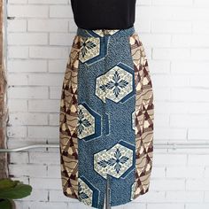 Our Liberian Lappa Pencil Skirt is not your average pencil skirt with vibrant kitenge pairings and ruched side seams creating a flattering fit for an hourglass figure. Details: 100% cotton Coconut button and zip closure in back For best results dry clean only Unyielding fabric, fits exact to size chart Please be sure to see our return & exchange policy. Clothing that does not fit may be exchanged for store credit only. Kitenge, Maxi Skirt, Pencil Skirt, Amber, Coconut, Size Chart, Dry Clean, Pencil, Skirt