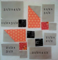 several pieces of fabric with numbers on them and one piece is cut into smaller squares