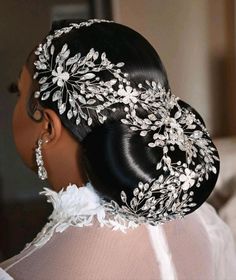 a woman wearing a bridal hair piece