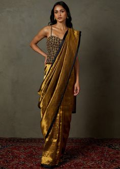 Editor's Note Dazzle in our black/gold zardozi with sootha begum sari, complete with a stitched blouse. This ensemble exudes opulence and style, making it an ideal choice for special occasions and events where you want to stand out with grace and sophistication. The intricate zardozi embroidery and the rich color combi Black And Golden Blouse, Plain Saree Blouse, Blouse And Palazzo, New Fashion Saree, Gold Saree, Golden Blouse, Golden Saree, Gold Haram, Zardozi Embroidery