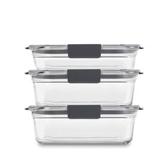 four clear plastic containers with black lids