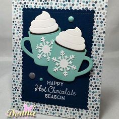 a blue and white card with two frosted cups on it, the words happy hot chocolate season