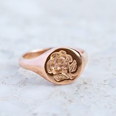 Our classic round signet has been hand engraved with a wax seal Rose. We are able to custom make any signet ring with your initials or family crest. Face measures 11mm round. Sarah Gardner, J Us, Silver Signet Ring, My Size, Wax Seal, Family Crest, Wax Seals, Hand Engraving, Signet Ring