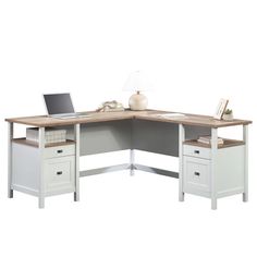 an office desk with two drawers and a laptop