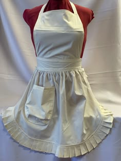 ** FABRIQUE CREATIONS ** VINTAGE / 50's STYLE FULL APRON / PINNY CREAM ONE SIZE ** HAND MADE & BRAND NEW ** Here we have a lovely poly cotton, cream, retro style apron, handmade in house to our own design. (see photos). Adjustable neck and waist ties so will fit up to a size 22. FC205F Other colour combinations available (please see my other items!.) If you don't see what you require, please contact us with your requirements Item specifics: Material - Poly cotton Colour - Cream Size (Approx) - one size Being the best, our aprons are often copied (badly) and they lack the quality, feel and love of a genuine Fabrique Creations apron. Don't waste your hard earned money on copies, buy the best and know it's been handmade with love to an extremely high standard About Fabrique Creations: Fabriqu Vintage Housewife Outfit, 1950s Housewife Fashion, 60s Apron, Housewife Apron, Apron Outfit, 50s Apron, Belle Blue Dress Costume, Bridal Apron, 1950s Apron