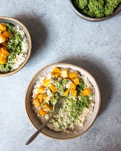 three bowls filled with rice and veggies on top of a white countertop