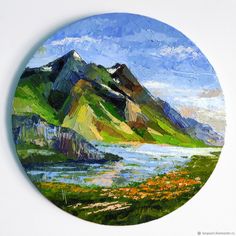 a painting of mountains and water on a white wall