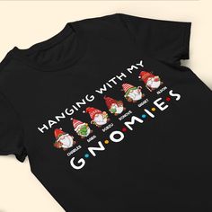 Introducing our "Hanging With My Gnomies" personalized shirt, the perfect way to show off your love for gnomes and celebrate your friendships. Whether you're a gnome enthusiast or just looking for a fun and unique gift for your friends and besties, this shirt is a delightful choice. Share the whimsy and charm of your gnome-filled adventures with this playful and personalized apparel.MESSAGE: Hanging With My Gnomies.PRODUCT DETAILS: 100% cotton (99% for ash/grey colors, 50% for hoodie) Decoration Hanging With My Gnomies, Picture Frame Light, Engraved Whiskey Glass, Mom Daughter Gifts, Canvas Beach Bag, Leather Flask, Wallet Gifts, Mom Daughter, 3d T Shirts