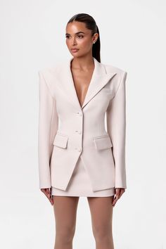 The iconic blazer suit, reimagined into an empowering form-fitting silhouette. Designed with long sleeves, notched collar and lapel, front pockets, front button down closures, and self-covered buttons at the cuffs. Style with our matching mini skirt to complete the look. Suiting Collection Import 94% Polyester, 6% Spandex Model wears size XS If between sizes, size down Blazer is lined Intern Aesthetic, Finesse Clothing, Realtor Aesthetic, Power Suits For Women, Mini Suits, Cool Outfit Ideas, Cool Outfit, Naked Wardrobe, Fashion Diy