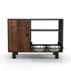 an entertainment center with two bowls on the front and one bowl on the back, against a white background