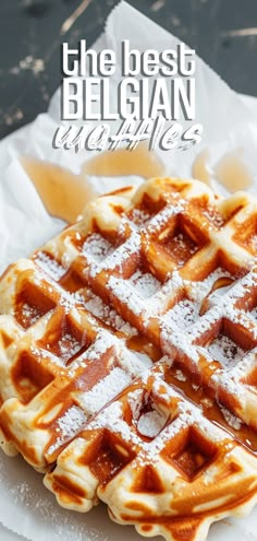 waffles with powdered sugar on top and the words, the best belgium waffles