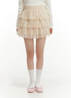 lace-frill-mini-skirt-of428 Beige Tiered Ruffle Skirt, Spring Party Skirt With Mini Hem, Feminine Beige Ruffled Skirt, Beige Feminine Skirt With Ruffles, Spring Party Mini Hem Skirt, Party Mini Tennis Skirt, Spring Party Skort With Mini Hem, Feminine Lace Mini Skirt For Party, Lace Mini Skirt For Party