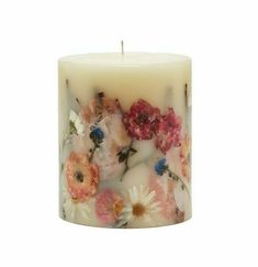 an image of a candle with flowers on it