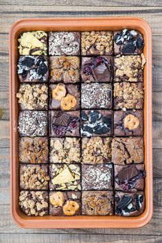 a brown tray filled with lots of different kinds of treats