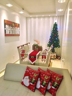 a living room filled with furniture and a christmas tree