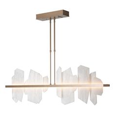 a modern chandelier with frosted glass shades