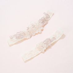 Maia Floral Lace Garter Set Elevate your wedding ensemble with our stunning garter set. Refer to our size chart for a perfect fit. Made of stretch lace and lined with silicone for a secure grip, this set is hand-sewn this requires at least 1-2 weeks before shipment. It also includes a toss garter and a keep garter, beautifully packaged in a keepsake box. Lace Garter Set, Heirloom Wedding, Bridal Accessories Jewelry, Wedding Shower Gifts, Bridal Party Proposal, Lace Garter, Bridesmaid Accessories, Garter Set, Bridal Belt