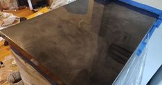 a large metal sheet sitting on top of a table