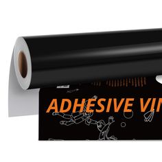 a roll of adhesive vinyl on top of a black box with an orange sticker