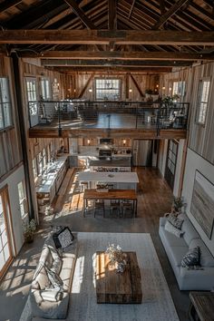 an overhead view of a living room with couches and tables