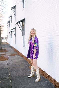 Embrace the vibrant energy of Mardi Gras with our Mardi Gras Mask Purple Sequin Dress. This bold t-shirt dress is covered in dazzling purple sequins and features intricately designed Mardi Gras masks on the sleeves. Runs true to size but you could size up for extra length! Little to no stretch Fully Lined Shell: 100% Polyester / Lining: 100% Polyester model, Lauren is 5'6" and wearing a size small MARDI GRAS ITEMS ARE FINAL SALE! Mardi Gras Outfits For Women, Mardi Gras Dress, Mardi Gras Masks, Purple Sequin Dress, Boutique Trends, Mardi Gras Mask, Vibrant Energy, Purple Dress