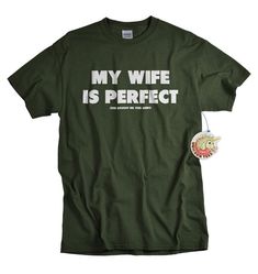 My Wife Is Perfect, She Bought Me This Shirt - Funny Gift For Husband From Wife    This is a great gift for a husband or fiancé. He can show off how Christmas Gifts For Fiances Family, Fun Gifts 2022, Mens Funny Christmas Shirts, $5 Gifts For Guys, Funny Shirts For Men Party, Top Gifts For 2022, Cheap Fitted T-shirt As A Gift, Christmas Gifts For A Second Marriage Couple, Funny Gender Neutral Gifts