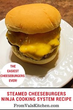 a cheeseburger is sitting on a plate with the words steak cheeseburgers ninja cooking system recipe