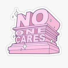 pink sticker with the words no one cares on top of stacked blocks and stars