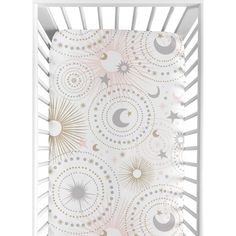 a baby crib with an abstract design on it