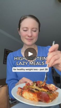 a woman eating food with a fork and knife