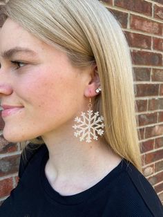 These lightweight dangle earrings feature a snowflake. They are perfect for holiday pictures and parties.  They also make a fantastic gift for yourself, best friend, mother, or gift exchange.-The picture features Glitter White-The french wires are nickel free.-2" in diameter-Includes Gift BoxI love making custom products! Please message me with your ideas!! White Drop Earrings For Holiday, White Drop Earrings For Holidays, White Winter Party Jewelry, Winter Party Dangle Jewelry, White Jewelry For Winter Holiday, Festive White Earrings For Winter, White Holiday Dangle Jewelry, Winter Gift Drop Earrings, White Festive Earrings For Winter