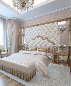 an elegant bedroom with gold and white furniture