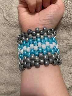 A beaded kandi cuff-style bracelet made in with pearlescent plastic pony beads in the style of the demiboy flag. Great to wear to LGBTQ+ events or just to show your pride! The string is elastic and stretchy to allow for easy wear on wrists of multiple sizes. The length is 30 beads, about 7 inches or so. If it's too big, you can always wear it further up your arm.  ALL ITEMS ARE HANDMADE BY ME, A DISABLED NONBINARY TRANS QUEER PERSON! Pride Kandi, Bead Kandi, Demiboy Flag, Diy Kandi Bracelets, Diy Kandi, Kandi Cuff, Kandi Bracelets, Pony Beads, Pride Flag