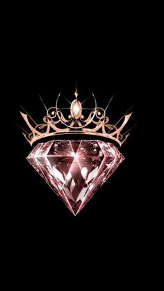 a pink diamond with a crown on it's head is lit up in the dark