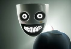 a creepy looking mask with eyes and mouth