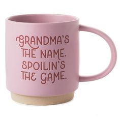 a pink coffee mug that says grandma's the name spoilin's the game