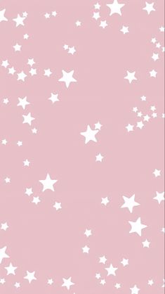 a pink background with white stars on it