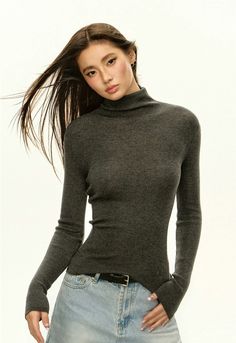 Embrace a touch of sophistication with this Slim Ribbed Turtleneck Sweater, a seamless blend of comfort and style.
Meticulously crafted from a balanced blend of polyester, nylon, acrylic, and wool, this high-collar, long-sleeve sweater epitomizes minimalist charm. The ribbed texture adds depth to the solid color scheme, while the slim fit hugs your silhouette, offering warmth without compromising on a sleek profile.
Whether paired with high-waisted trousers for a professional setting or layered Fitted Knitted Turtleneck Top, Fitted Fine Knit Turtleneck Top, Fine Knit Fitted Turtleneck Top, Fitted Knitted Long Sleeve Turtleneck, Fitted Ribbed Collar Turtleneck Top, Ribbed Turtleneck Sweater, Ribbed Turtleneck, Ribbed Texture, Women Hoodies Sweatshirts