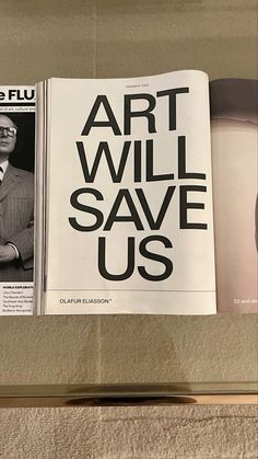 an article in the art will save us magazine is displayed on a shelf next to a pair of scissors