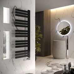 a bathroom with marble walls and flooring next to a round mirror on the wall