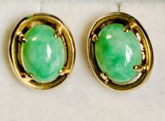 Vintage 14k Apple Green Jade Post Earrings. Weight 3 Grams. Tested 14k yellow gold. Metal may show minor natural patina and/or surface scratches from wear. Condition is in very good Pre-owned. Note: We test all metals with nitric acid. We test gemstones with a Presidium gem tester. Gem testers cannot differentiate between natural and synthetic gemstones. The properties of many gemstones overlap and could potentially be one a variety of gemstones. While we do our best, based on tester readings and our knowledge, we are not GIA certified gemologists. You are encouraged to ask questions prior to purchasing. We do offer a 14-day, money back guarantee if you are not completely satisfied with your purchase. Heirloom Green Cabochon Jewelry, Jade Earrings Vintage, Antique Green Jade Jewelry, Vintage Green Jade Earrings, Luxury Jade Cabochon Earrings, Jade Green, Fine Jewellery Earrings, Post Earrings, Jade