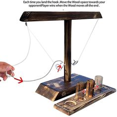 Experience endless fun with our Wooden Ring Toss Game, perfect for home bars and parties. This handmade game features a classic design where players try to land a ring on a hook. Ideal for indoor and outdoor settings, it’s great for friends, couples, and family. Easy to assemble and portable, it includes a rope, ring, and hook. Made from high-quality wood with a rugged look, it’s suitable for ages 12 and up. Note: Color may vary slightly, and a slight odor may be present initially. Enjoy fast-paced, interactive gameplay with this addictive and exciting game! Ring Hook Game, Ladder Game, Hook Game, Throwing Games, Garage Party, Ladders Game, Wooden Board Games, Ring Hook, Ring Toss Game