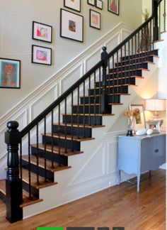 the stairs in this home are black and white