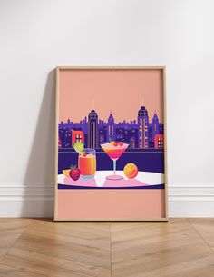 an art print of drinks on a table in front of a cityscape