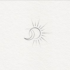 the sun and moon are drawn on paper