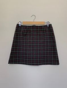 "Authentic 90's vintage plaid skirt. Classic gray multi colored plaid pattern. Shorter in length. Zipper closure in back. Skirt is in excellent clean condition. Measurements (taken zipped or buttoned up and laid comfortably flat) x2 inches Tag Size 9 Waist 30\"~31\" Hips 39\" Length 16\" All items are free of rips, tears, holes, and stains unless otherwise noted. Vintage items are subject to signs of previous wear." Gray Plaid Skirt, Levis Jeans High Waisted, Grey Plaid Skirt, Levi High Waisted Shorts, Levis Mom Jeans, Preppy Skirt, Grunge Skirt, 90s Preppy, Most Comfortable Jeans