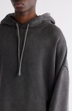 A reflective logo patch centers the back of this hoodie cut in a relaxed fit with roomy dropped shoulders and finished with a heavy garment-dyed finish. 24" length (size Medium) Drawstring hood Ribbed cuffs and hem 100% organic cotton Machine wash, line dry Made in Portugal Washed Black Drawstring Hood Sweatshirt, Washed Black Sweatshirt With Drawstring Hood For Loungewear, Washed Black Drawstring Hood Sweatshirt For Loungewear, Streetwear Washed Black Hoodie With Ribbed Cuffs, Washed Black Hoodie With Ribbed Cuffs For Streetwear, Faded Hoodie Sweatshirt With Drawstring Hood, Sporty Oversized Faded Sweatshirt, Urban Washed Black Hoodie With Drawstring, Urban-style Washed Black Hoodie With Drawstring Hood