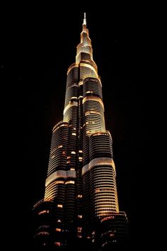 the tallest building in the world is lit up at night