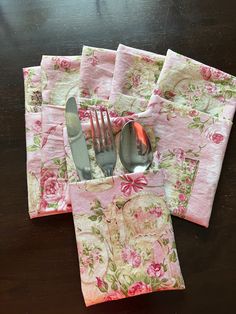 four napkins with forks and spoons on them