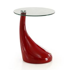 a red table with a glass top and curved design on the bottom, against a white background